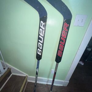 Lot of 2 hockey Bauer Goalie Sticks in Black with Red & White Logos